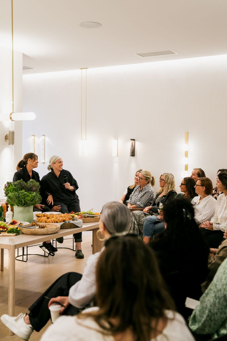 Women gathered in conversation at a workshop